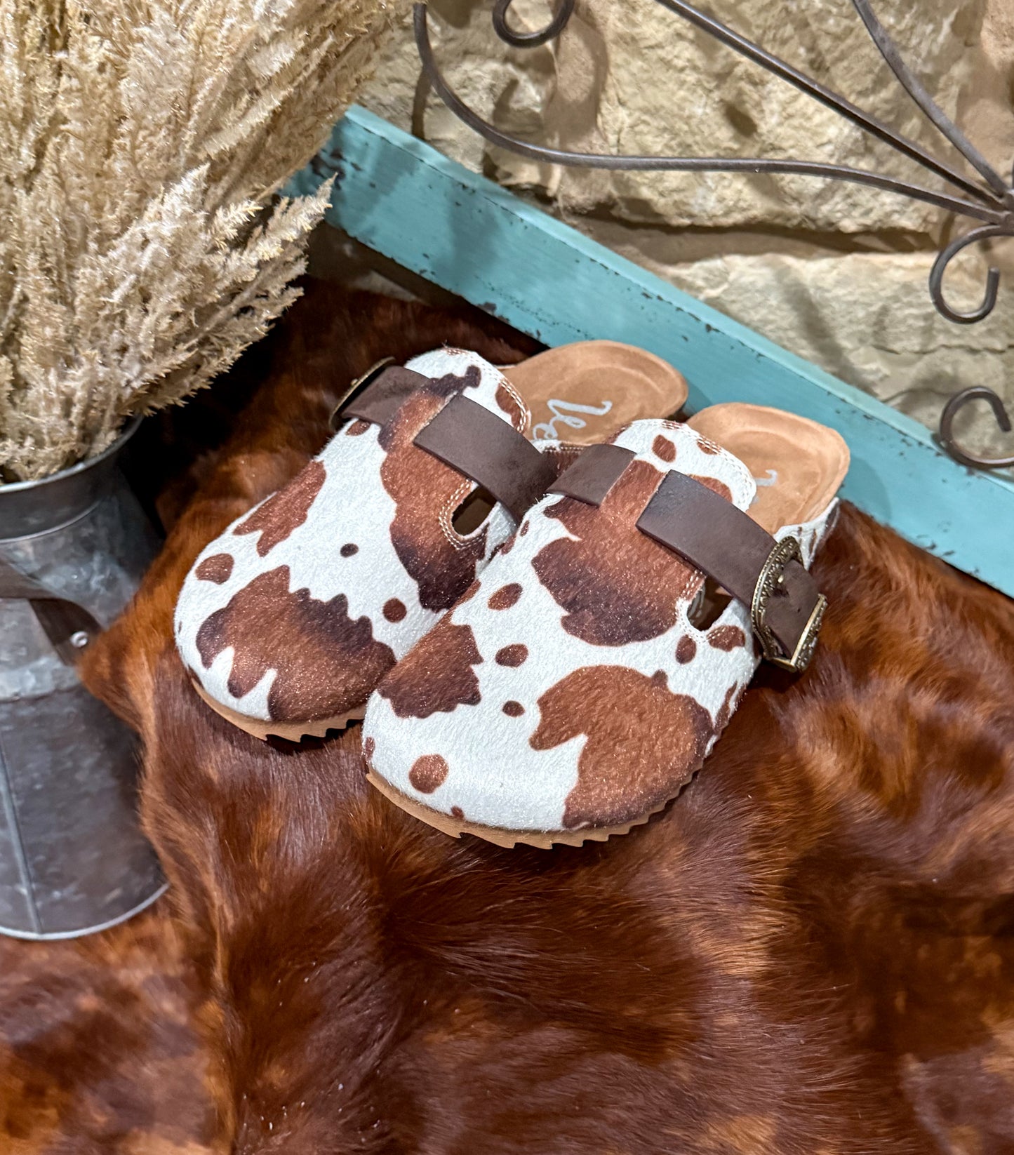 Cow Print Slip-Ons