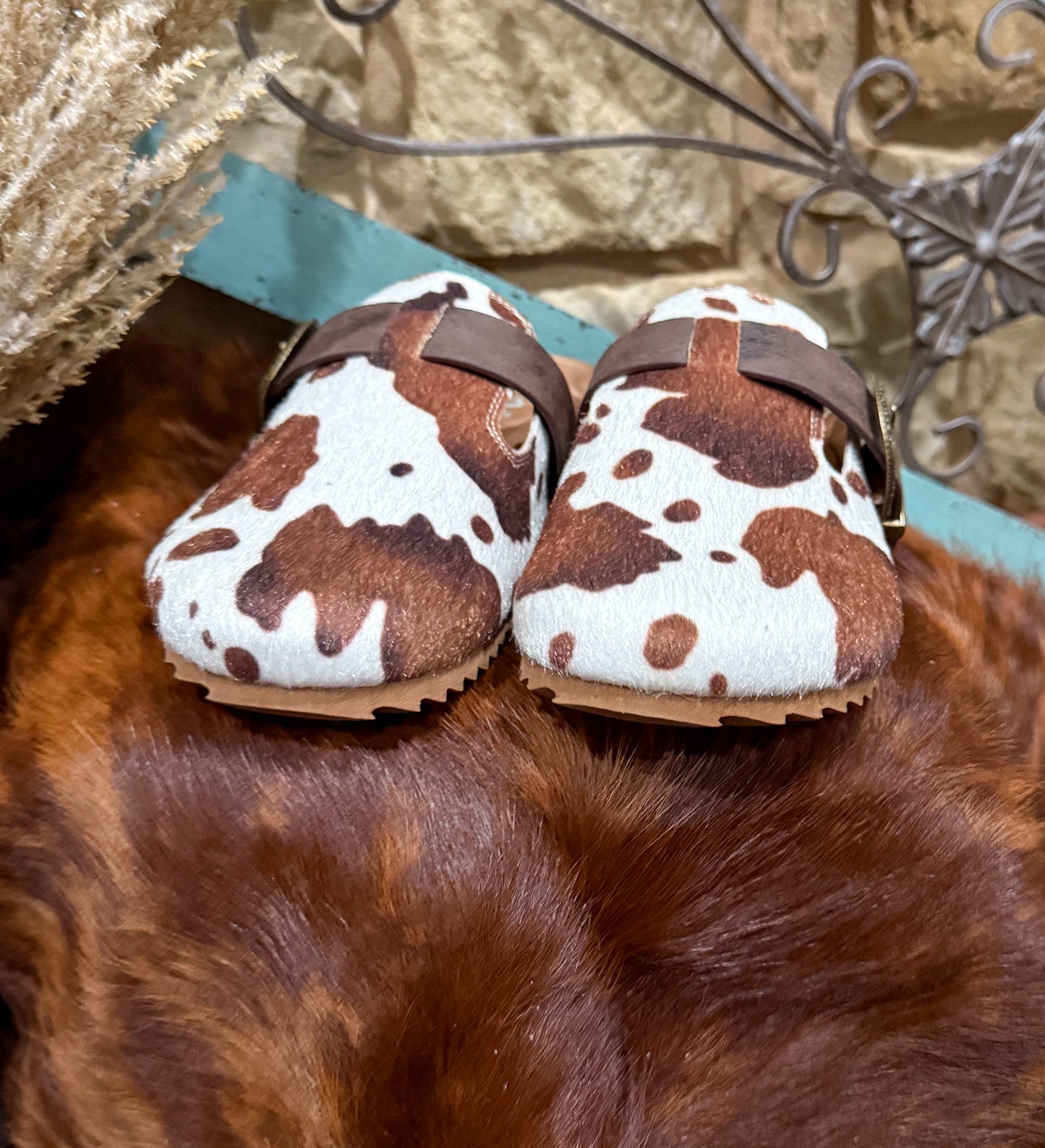 Cow Print Slip-Ons