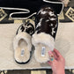 Cowhide Myra Slippers {Black & White}