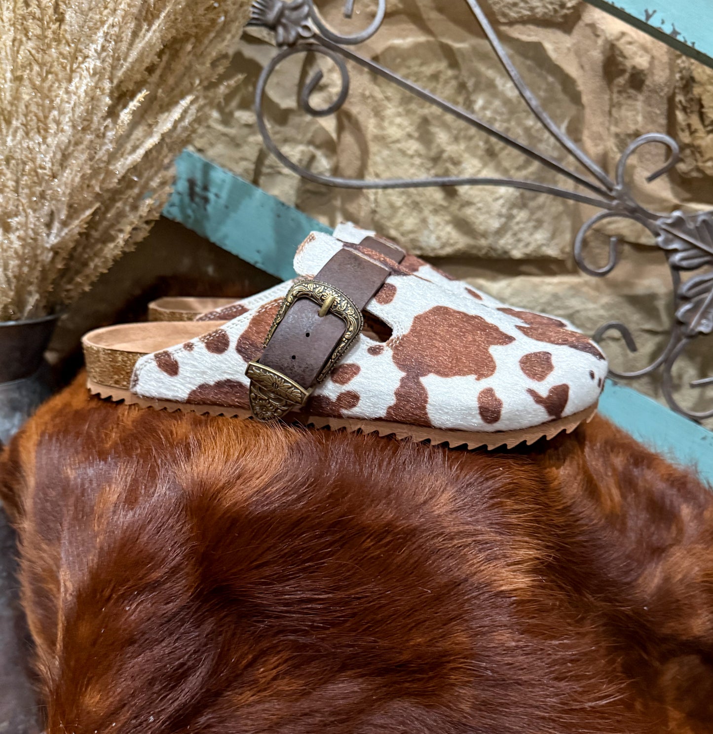 Cow Print Slip-Ons